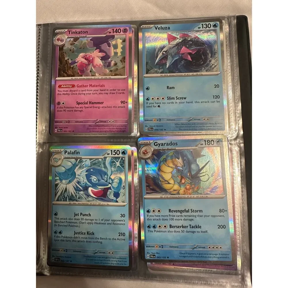 Lot of 80 holographic rare Pokemon cards.